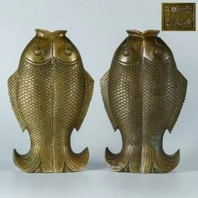 A pair of Ming bronze Pisces