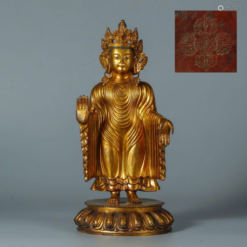A gilt bronze statue of a thousand-clothed Buddha