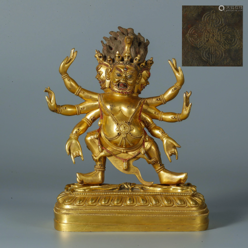 A gilt bronze statue with horse head and vajra st…