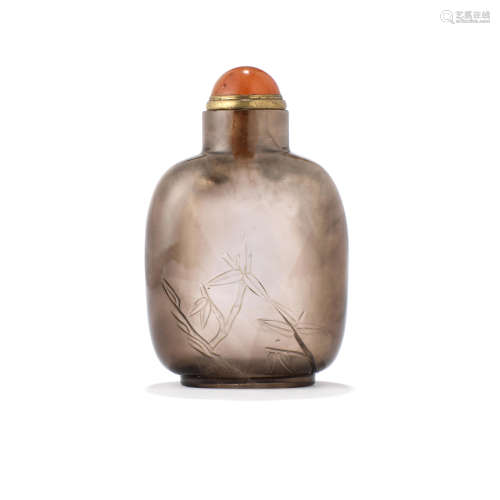 A carved smoky crystal snuff bottle   1750-1850