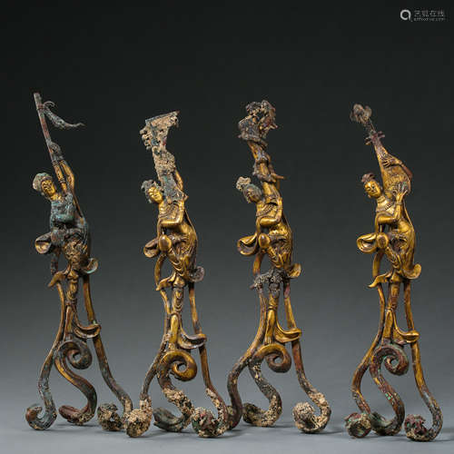 FOUR ANCIENT CHINESE GILT BRONZE DANCERS