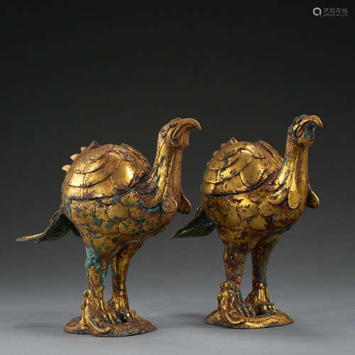 A PAIR OF ANCIENT CHINESE GILT BRONZE PHOENIX BIRDS