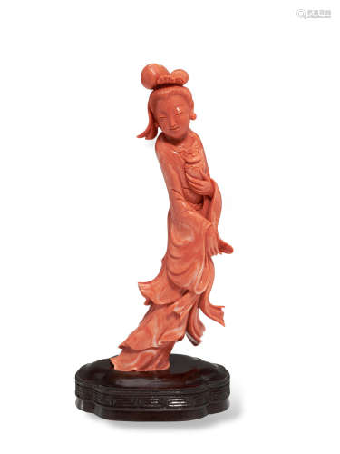 A CARVED CORAL FIGURE OF A WOMAN Late 19th/early 20th century