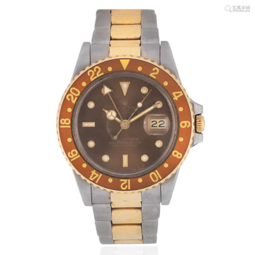 Rolex. A stainless steel and gold automatic calendar bracelet watch with dual time zone GMT Master, Ref: 16753, Circa 1986