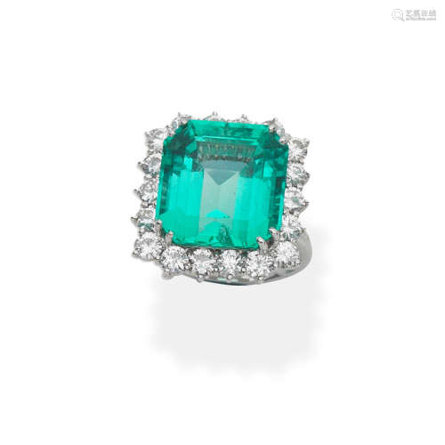 Emerald ring and diamond cluster ring