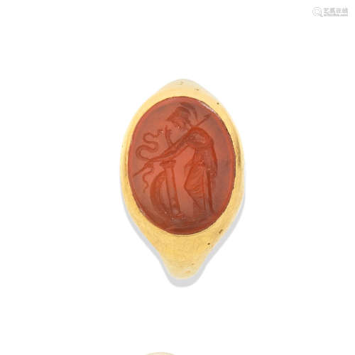 A Roman gold ring with a carnelian intaglio of Athena