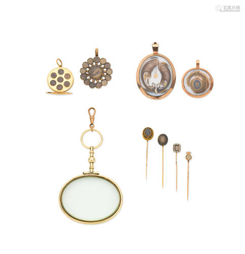 Collection of mourning jewellery and a magnifying glass, late 18th - mid 19th century (9)