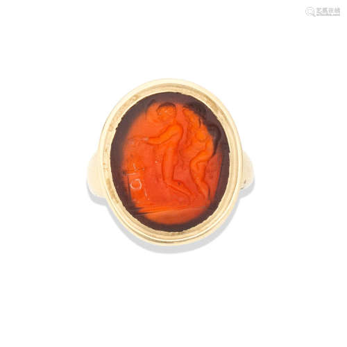 A carnelian intaglio of a satyr and a youth at an altar, probably Roman Probably circa 1st-2nd Century A.D.