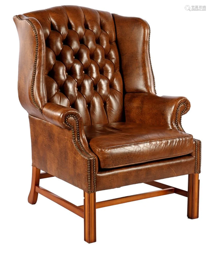 Brown leather wing chair