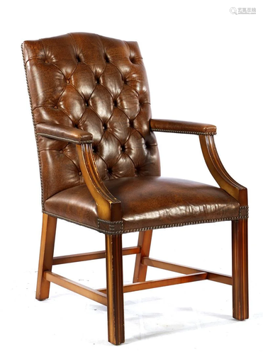 Brown leather armchair