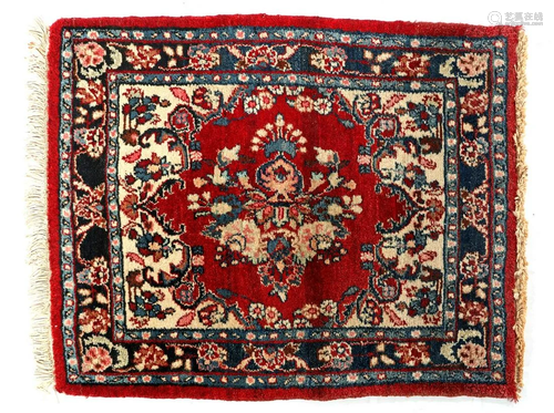 Oriental hand-knotted rug