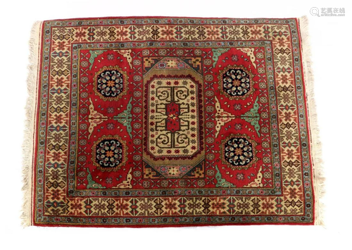 Oriental hand-knotted rug