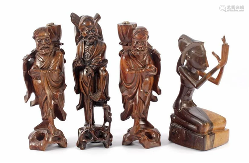 3 Asian wooden bombarded statues