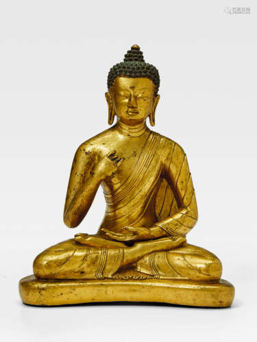 A GILT COPPER ALLOY FIGURE OF THE CONFESSION BUDDHA SUVIKRANTA TIBET, CIRCA 17TH CENTURY