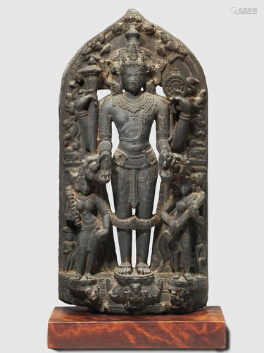 A BLACKSTONE STELE OF VISHNU NORTHEASTERN INDA, PALA-SENA PERIOD, CIRCA 11TH CENTURY