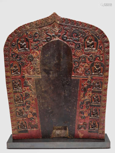 A POLYCHROMED WOOD TORANA WITH TWELVE BODHISATTVAS TIBET, CIRCA 13TH CENTURY