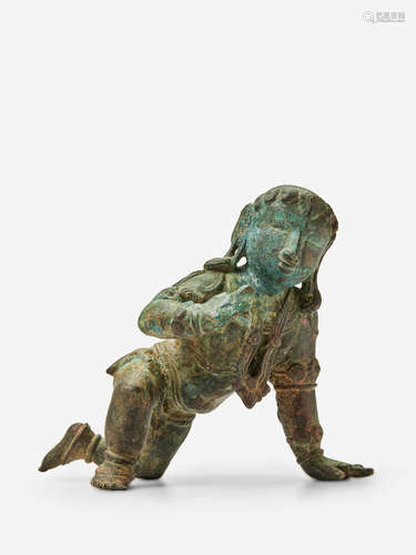 A COPPER ALLOY FIGURE KRISHNA, THE BUTTER THIEF TAMIL NADU, CHOLA PERIOD, CIRCA 13TH CENTURY