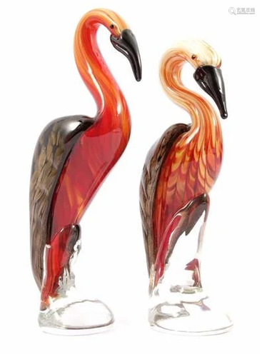 2 colored glass cranes