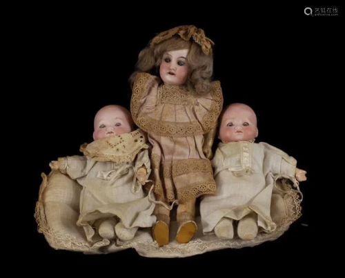 3 old dolls