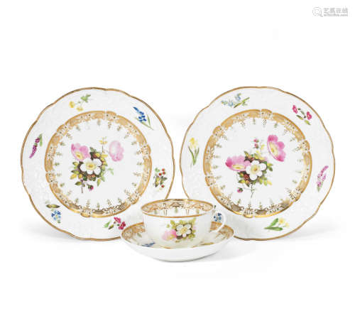 A good pair of Swansea deep plates and a breakfast cup and saucer, circa 1815-17