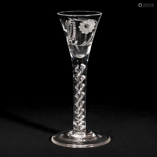 An engraved airtwist cordial glass, circa 1750