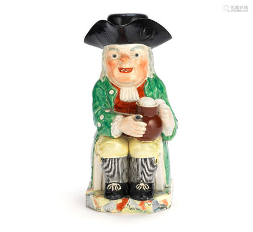 An enamelled creamware Toby Jug and cover, circa 1790
