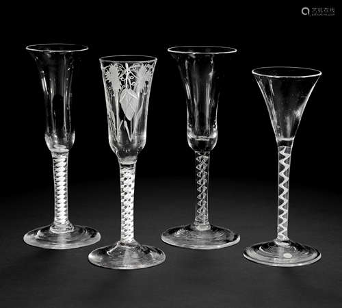 An ale glass, a wine or toasting glass and two wine flutes with twist stems, circa 1750-65