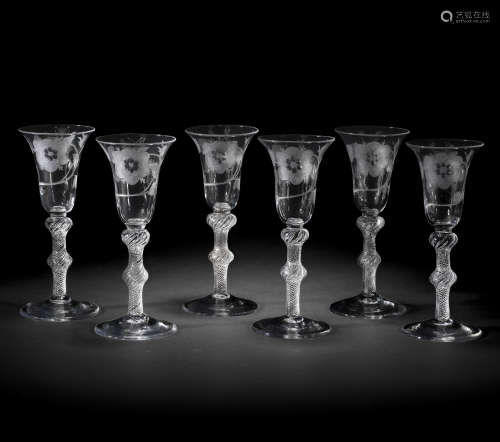 A rare set of six Jacobite engraved airtwist wine glasses, circa 1750