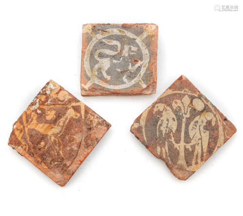 Three medieval encaustic floor tiles, 14th century