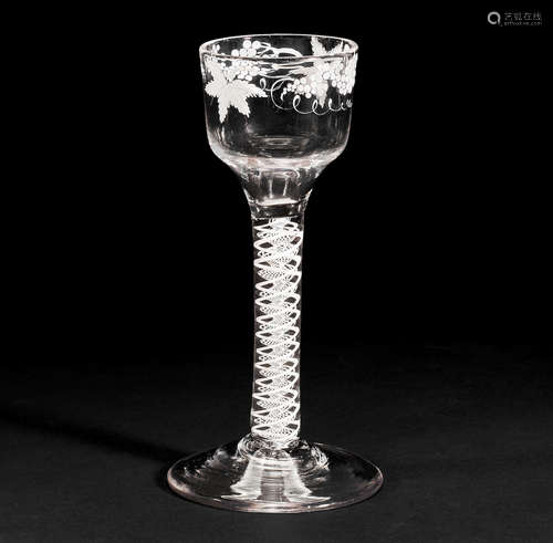 A Beilby enamelled opaque twist wine glass, circa 1765