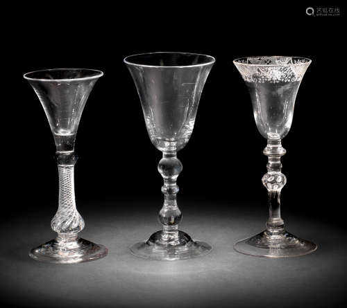 A composite-stem wine glass and two light baluster glasses, circa 1750-60