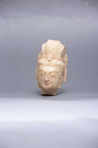 A Carved Head Of Stone Buddha