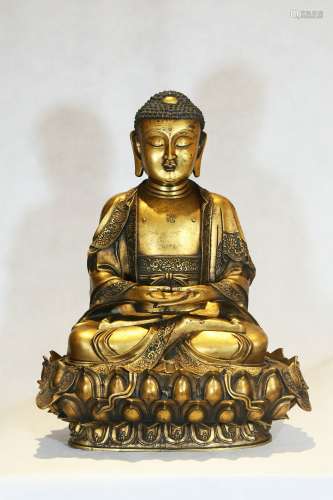 A Gilt Bronze Figure Of Sakyamuni