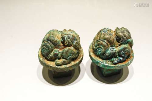 A Pair Of Early Bronze Button Beasts