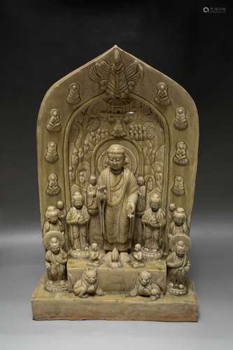 A Celadon Glazed Porcelain Buddha Statue