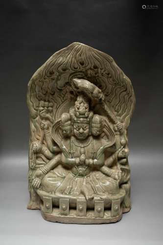 A Celadon Glazed Porcelain Buddha Statue