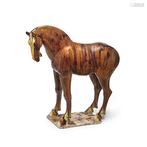 A LARGE CHESTNUT-GLAZED POTTERY HORSE Tang dynasty