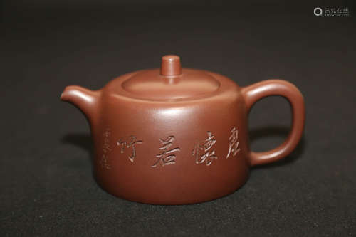 A Chinese Inscribed Purple Sand Pot