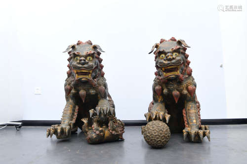 A Pair of Chinese Gild Copper Male Lion and Female Lion Ornaments