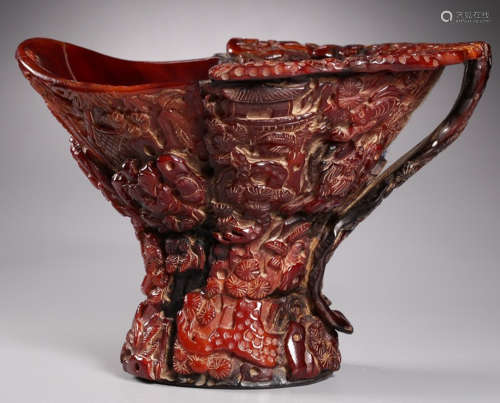 A NIUJIAO CARVED LANDSCAPE PATTERN CUP