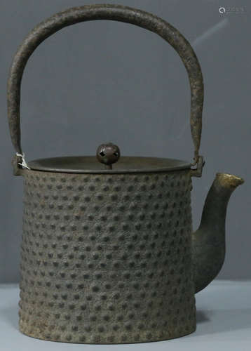 AN IRON CASTED POT