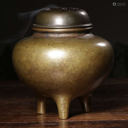 A COPPER WITH GOLD TIRPOD CENSER