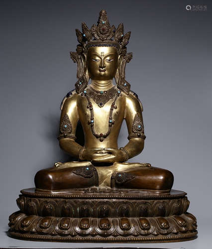 A GILT BRONZE CAST BUDDHA STATUE