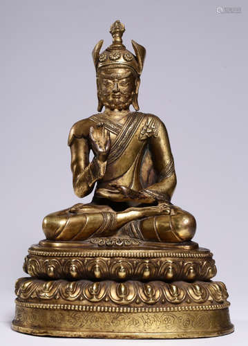 A GILT BRONZE CAST BUDDHA STATUE