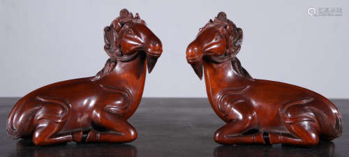 PAIR OF HUANGYANG WOOD HORSE SHAPE PAPERWEIGHTS