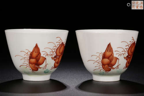 PAIR OF WHITE ALUM RED GLAZE BIRD PATTERN CUPS