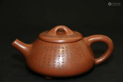 A Chinese Inscribed Purple Sand Pot