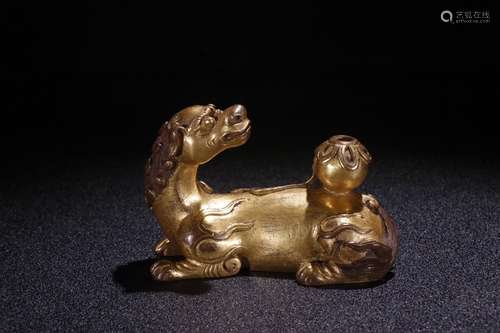 A Chinese Gilt Bronze Paperweight Of Lion Shaped