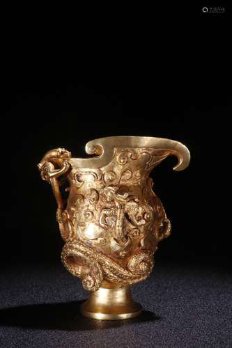 A Chinese Gilt Bronze Vessel With Dragon Carving