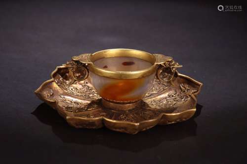 A Chinese Gilt Bronze Candle Holder With Agate